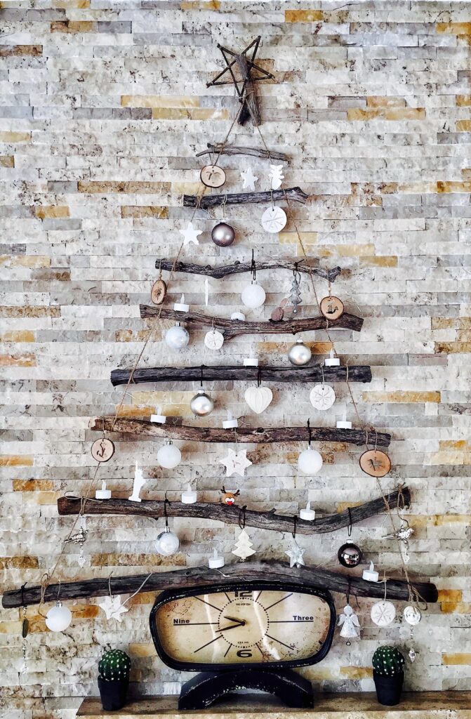 A DIY Christmas ree using tree trunks