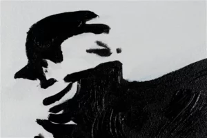 A close-up look of a hand-painted face of a guy