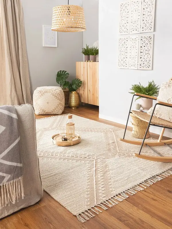 a minimalist handmade rug in beige color