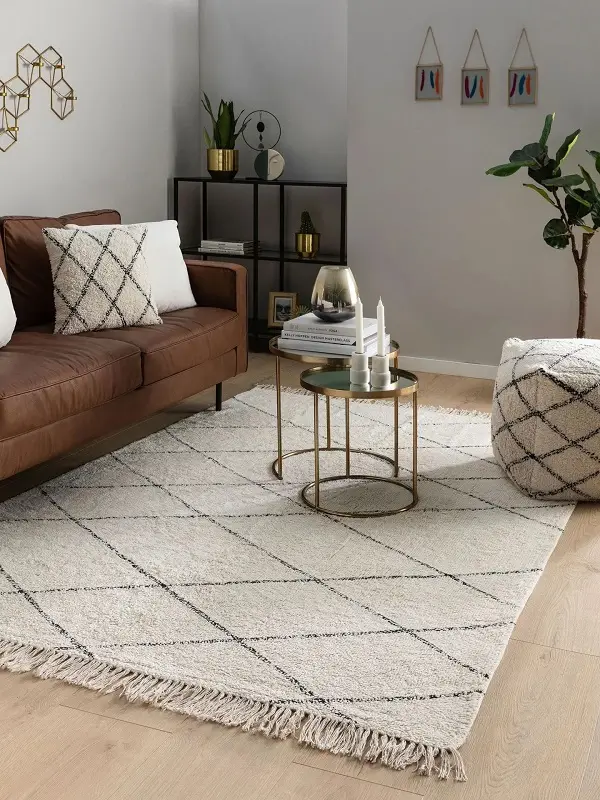 a geometric design rug in beige color