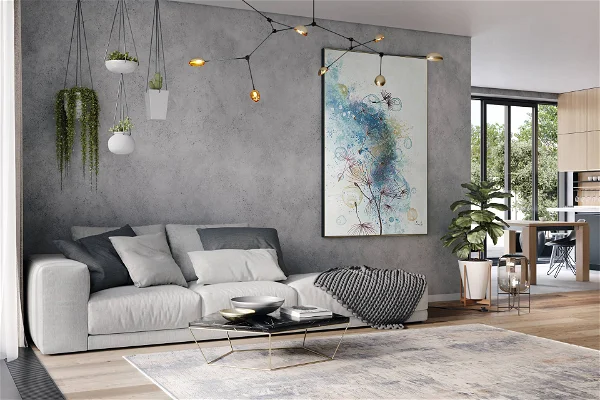 Een woonkamer met een abstracte muurschildering, plafondverlichting en een beige bank