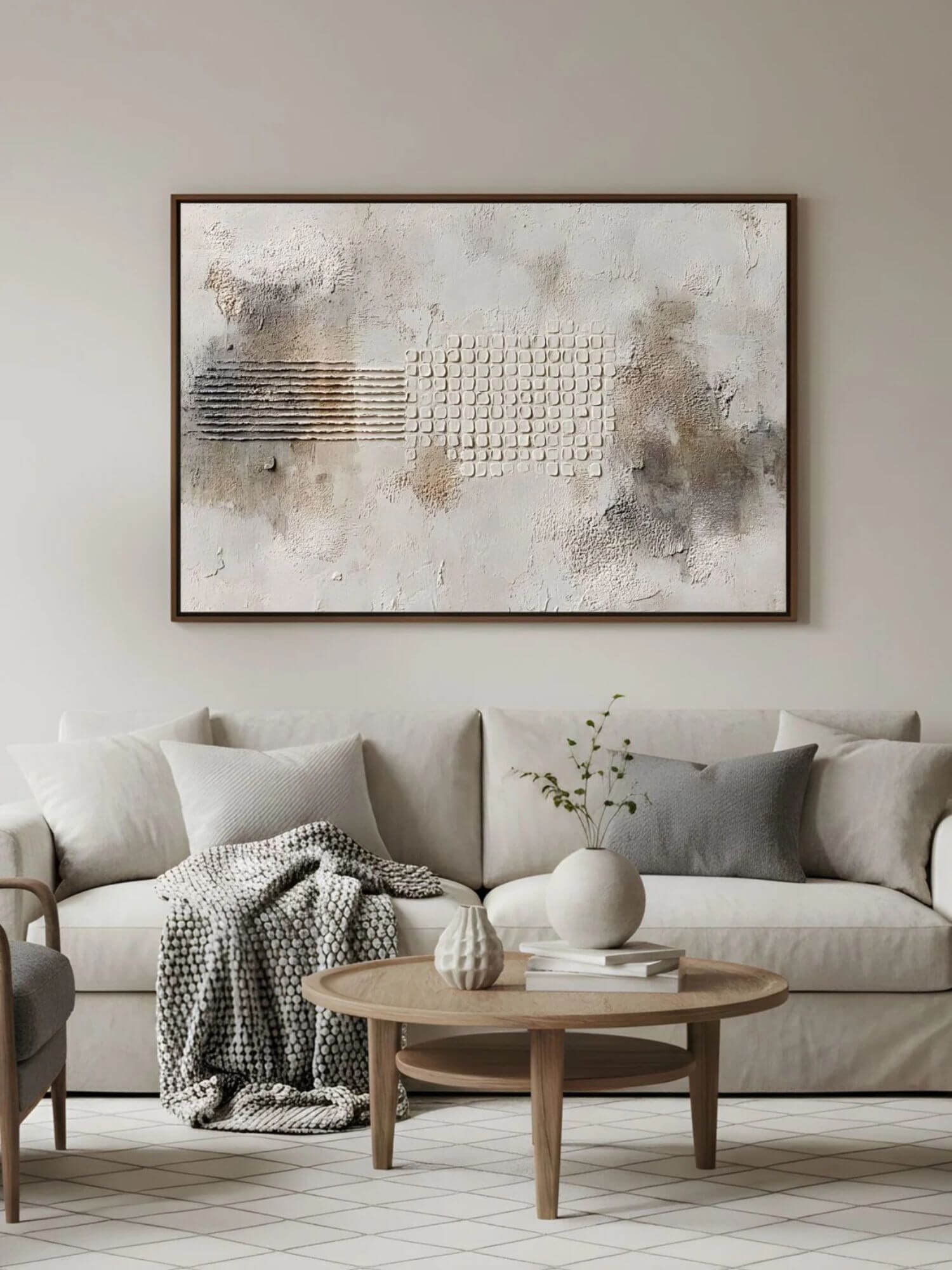 Neutral living room with horizontal textured abstract artwork above a beige sofa.